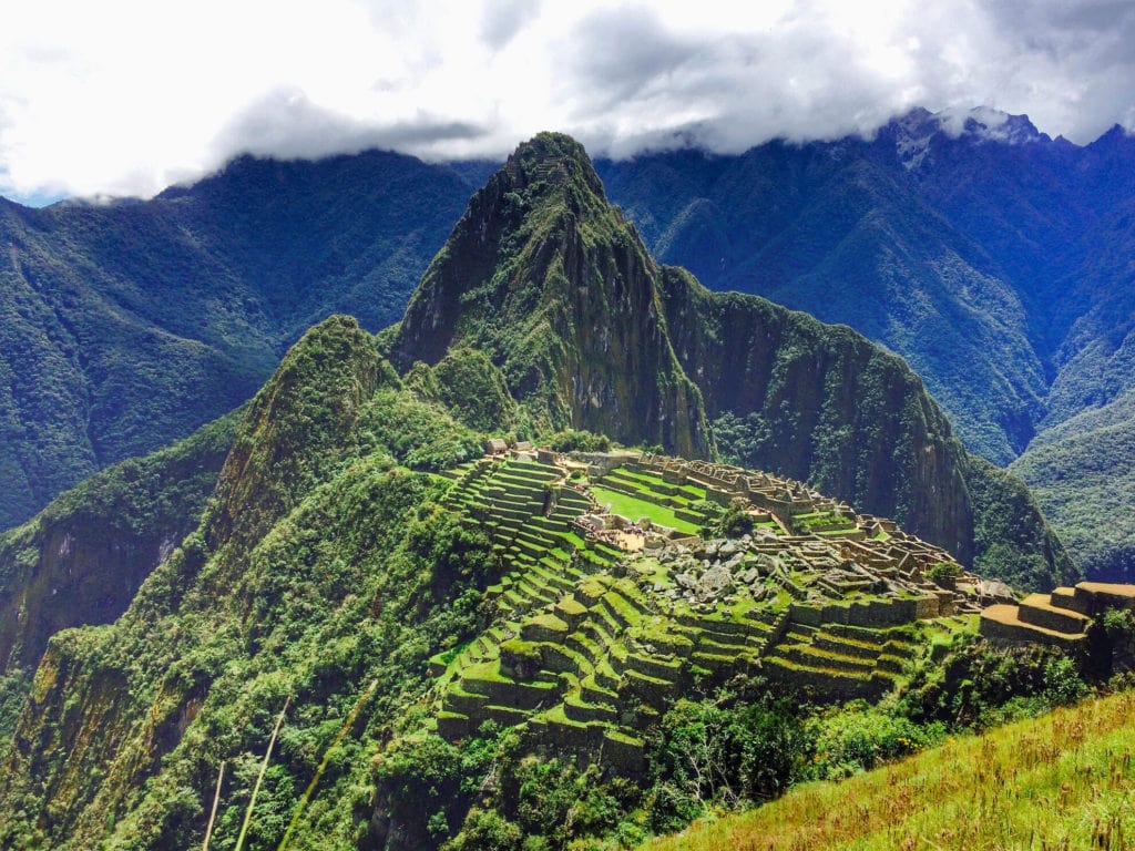 Lush landscape with mountains and clear water